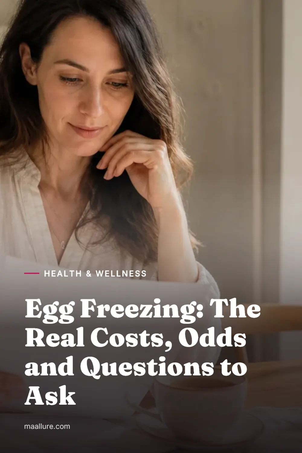 A woman in her thirties sits at a sunlit kitchen table with tea and a notebook, reviewing notes before a fertility consultation