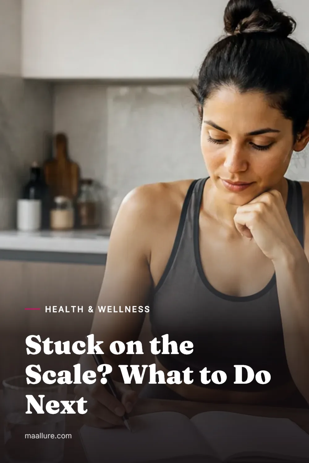 Woman in a bright kitchen reviewing her weight loss plan beside fruit and a workout mat