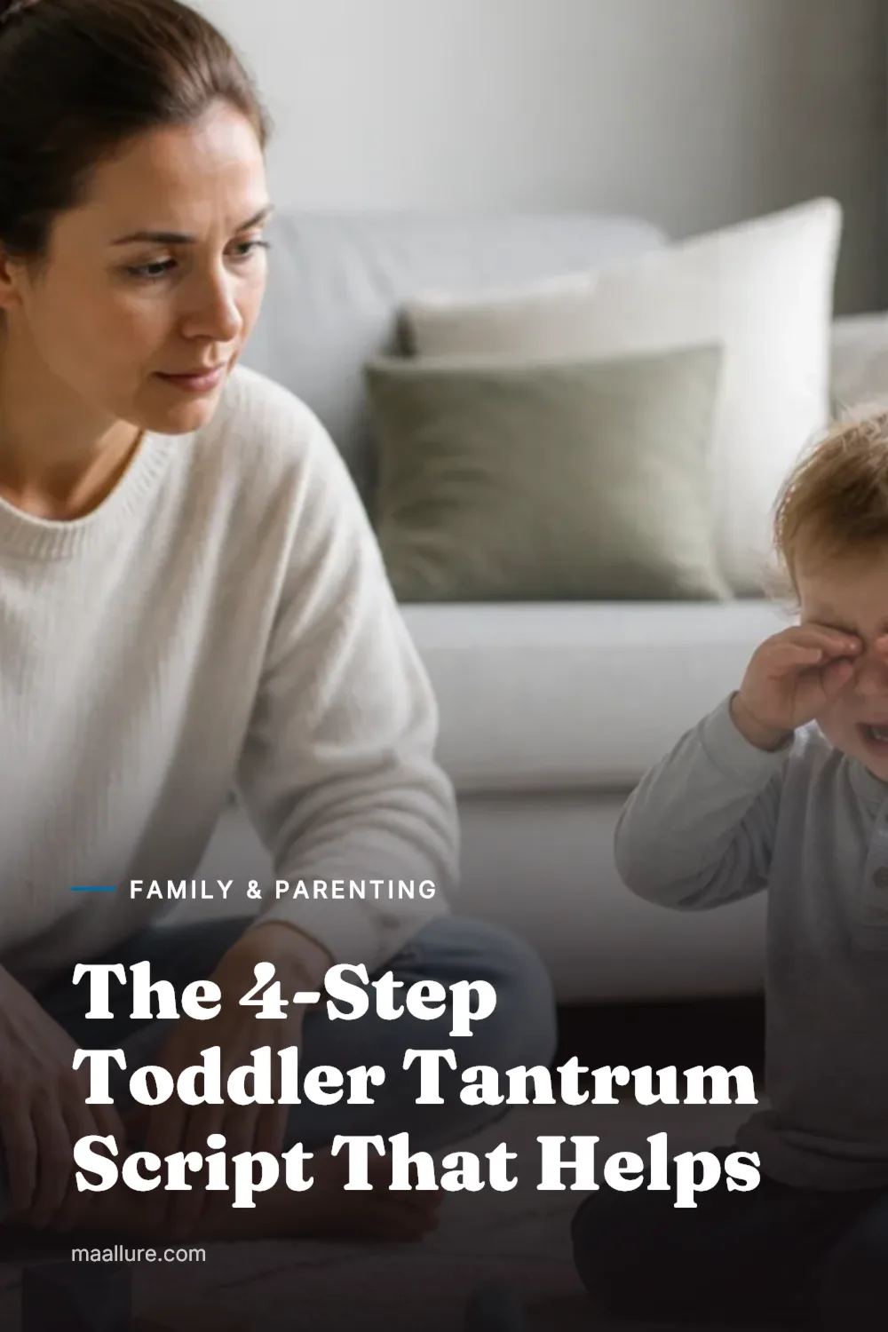 A calm parent sitting near an upset toddler during a tantrum at home