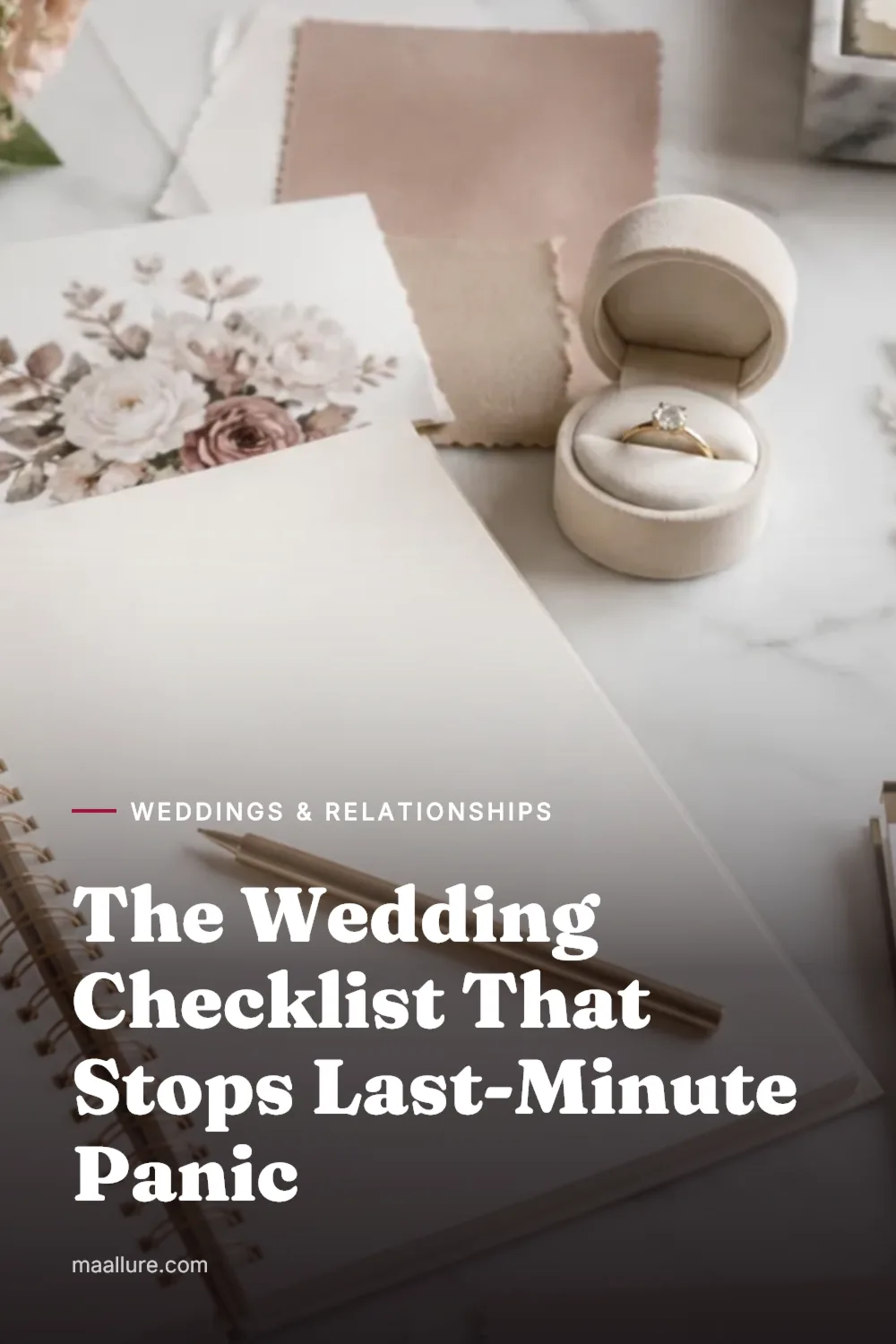 Wedding planning notebook with calendar, ring, flowers and stationery on a bright table